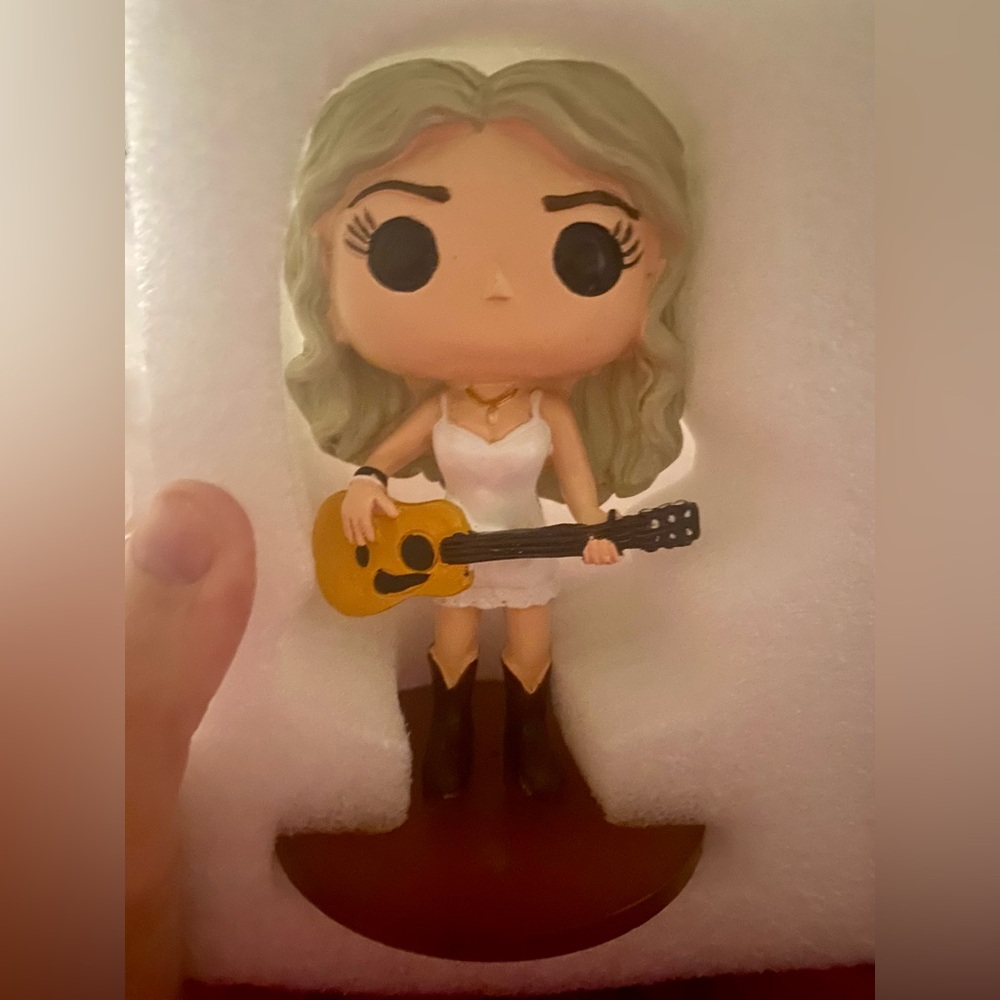 Taylor Swift Figurine on stand